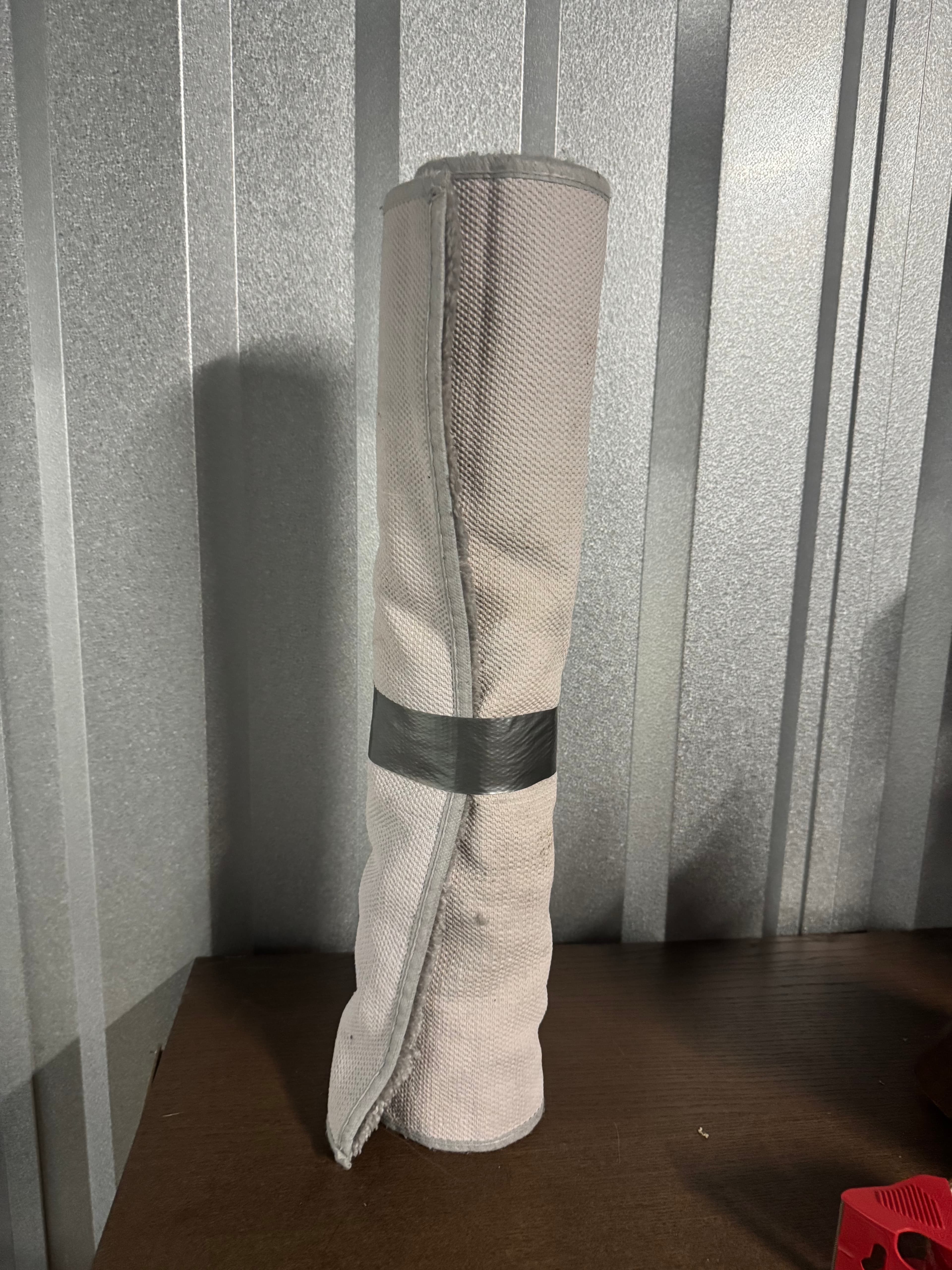 Rolled-up White Mat